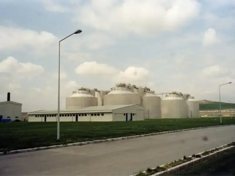 Digester tanks and a plant building at the Ankara City biogas plant.